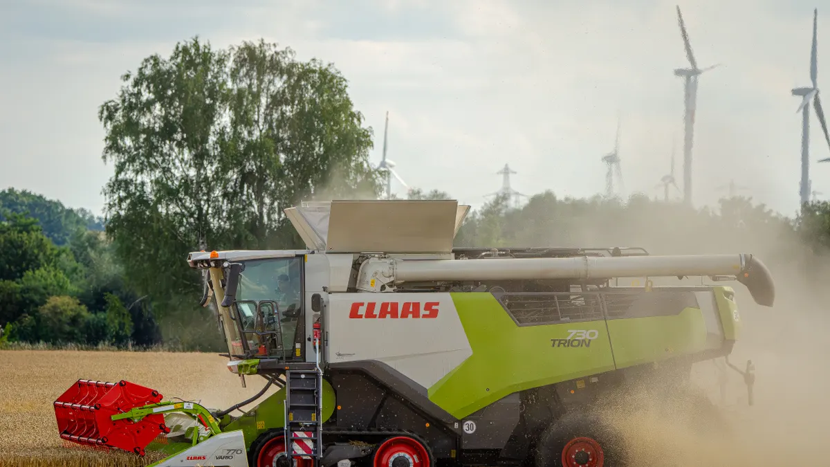Combine harvester working in a field